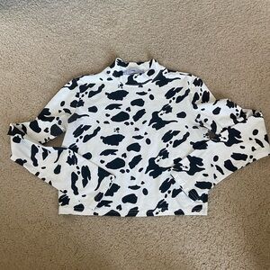 Cow print turtleneck